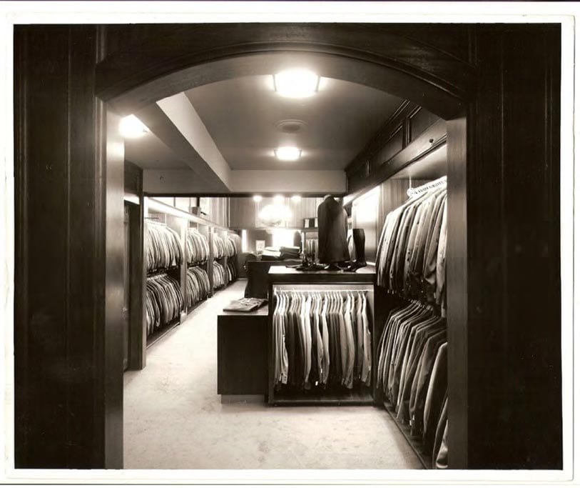 Archival photograph of suit racks inside Cable Car Clothiers